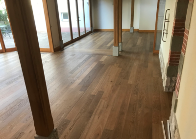 Revêtement de sol parquet sombre - Sols Passion