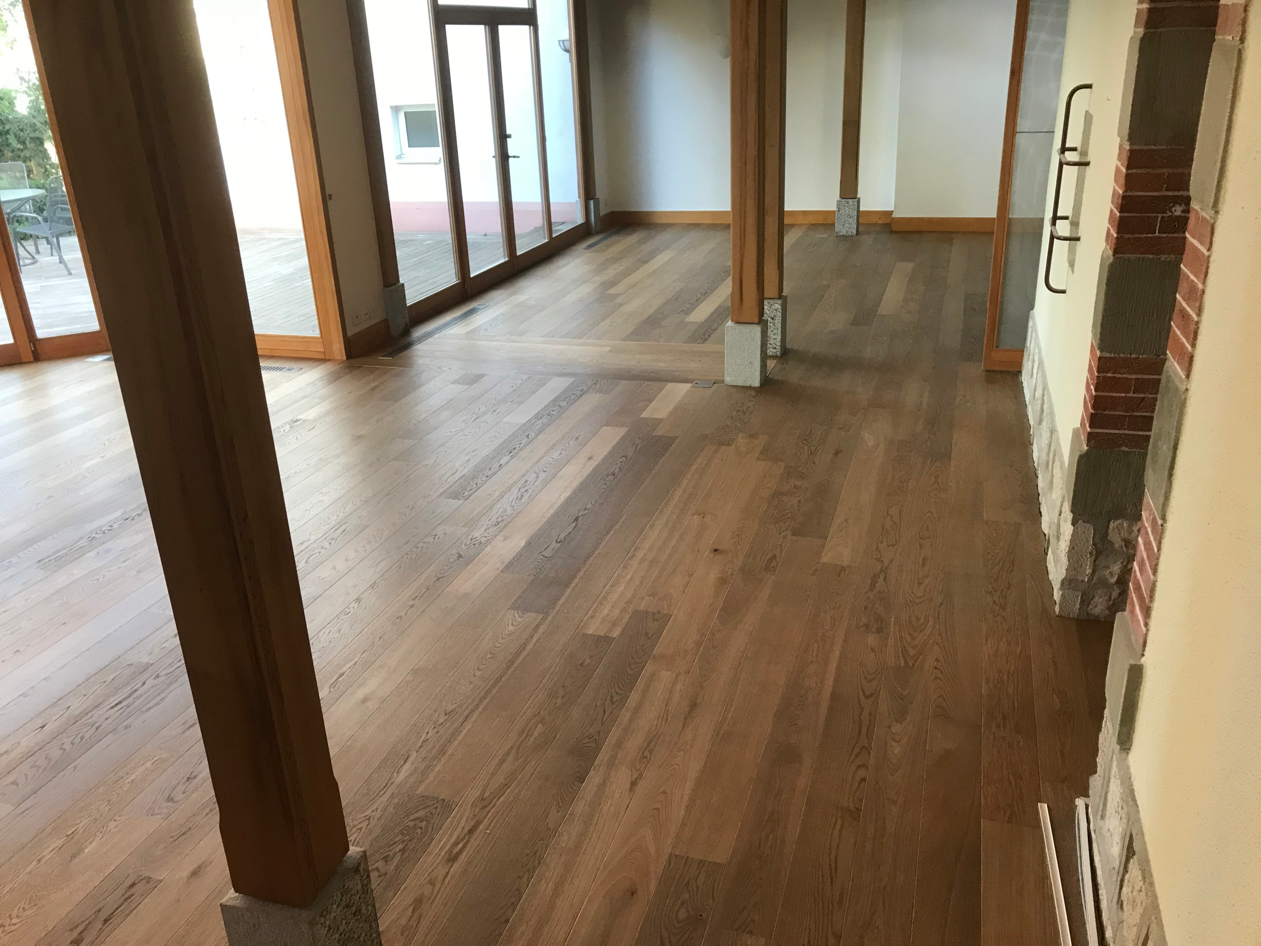 Revêtement de sol parquet sombre - Sols Passion